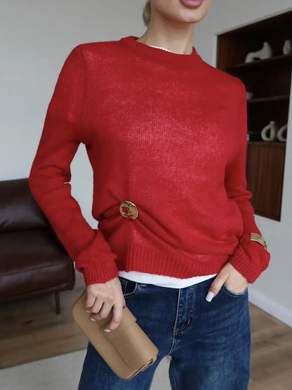 Maglia in misto Mohair, morbida e traforata, scollo tondo, con vestibilità normale e  aspetto minimal fashion