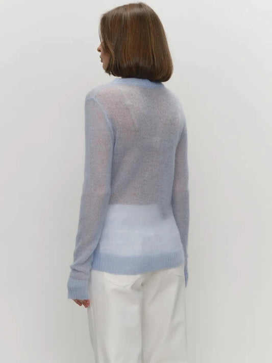 Maglia in misto Mohair, morbida e traforata, scollo tondo, con vestibilità normale e  aspetto minimal fashion
