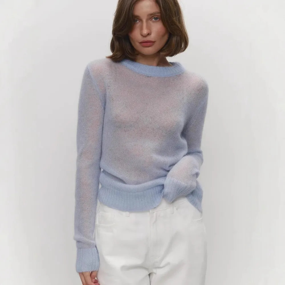 Maglia in misto Mohair, morbida e traforata, scollo tondo, con vestibilità normale e  aspetto minimal fashion